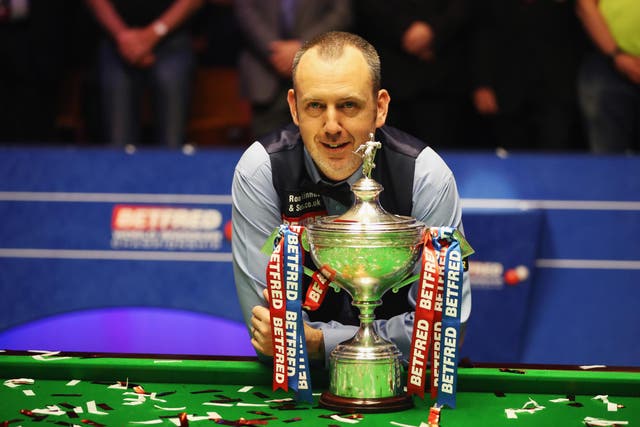 Mark Williams poses after clinching his third world title