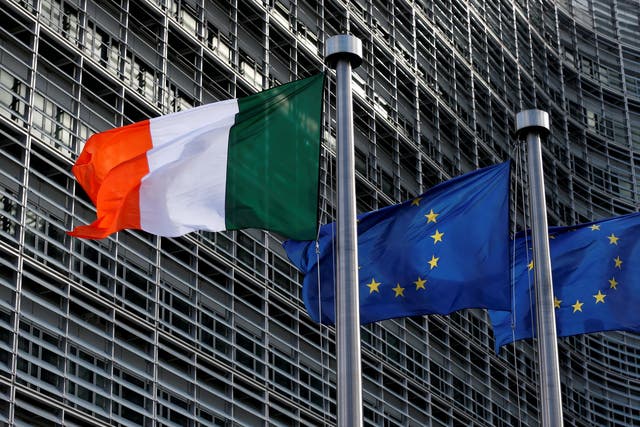 Irish and European Union flags outside the European Commission headquarters in Brussels