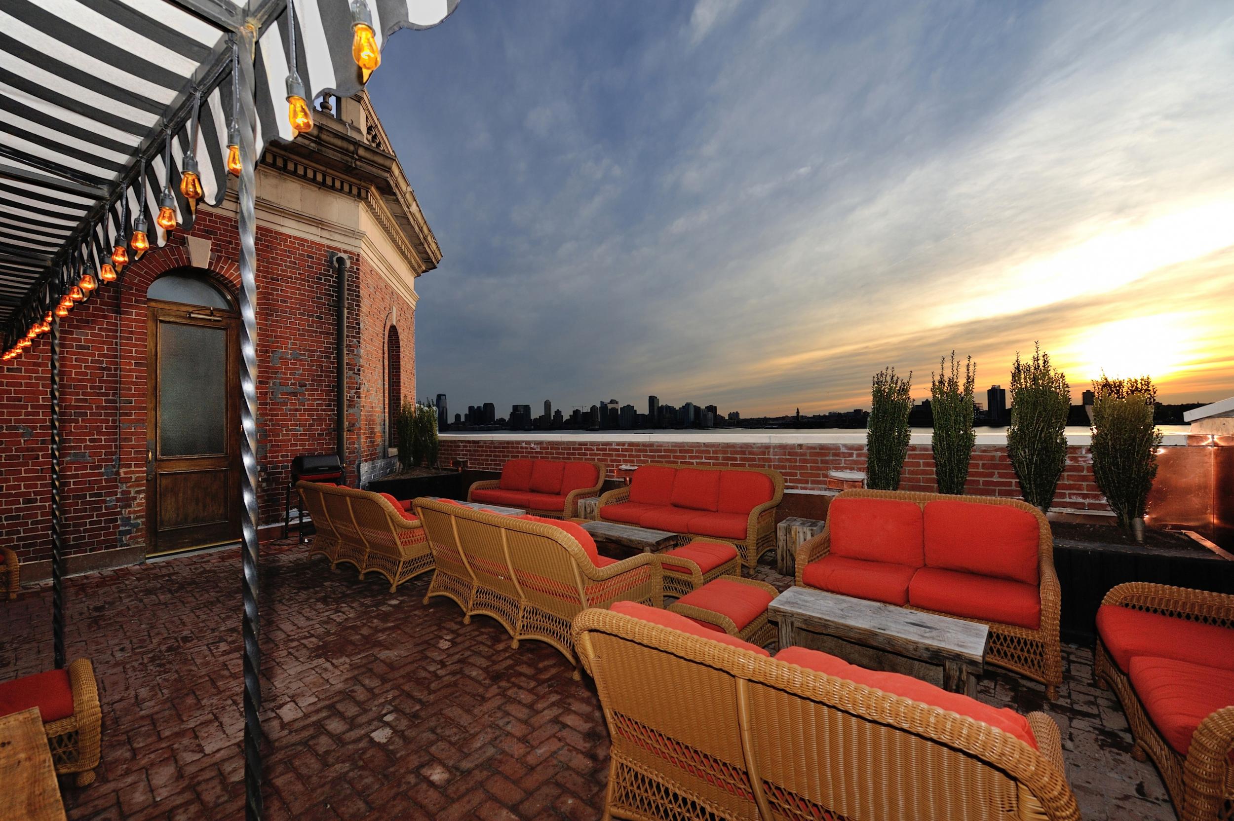 The Jane rooftop bar has cocktails and couches