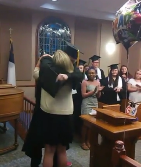 Dalton Jackson hugs his principal as he graduates high school (Facebook)