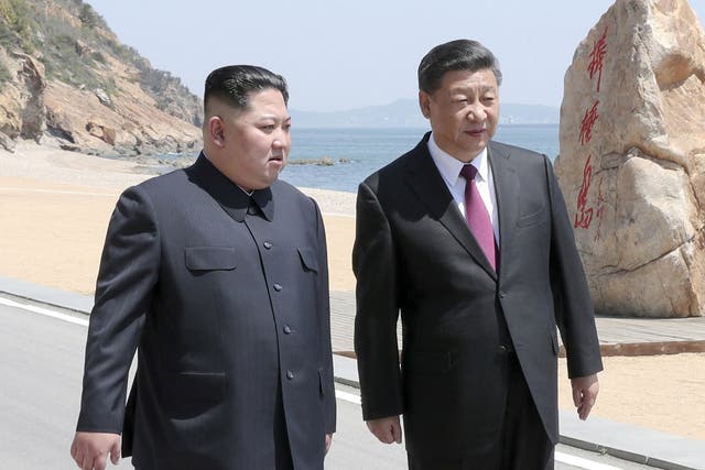 Chinese President Xi Jinping and North Korean leader Kim Jong-un meet in Dalian, China