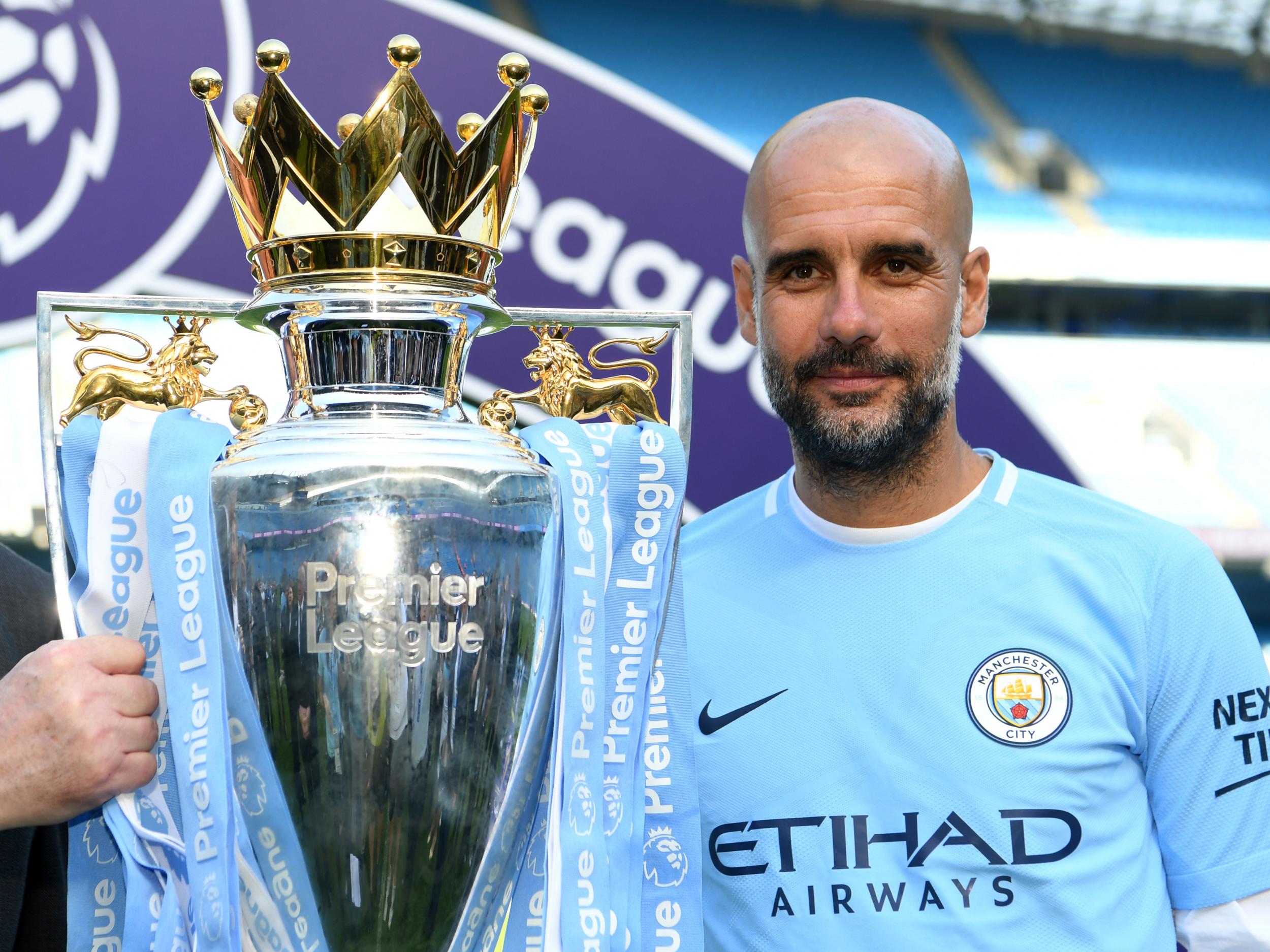 Pep Guardiola celebrated his first Premier League title win on Sunday