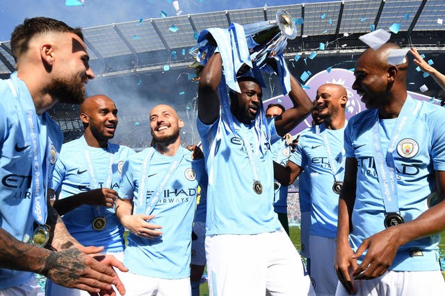 Yaya Touré celebrated Manchester City's title win after Sunday's draw with Huddersfield