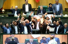 Iran MPs burn US flag in parliament and chant ‘death to America’