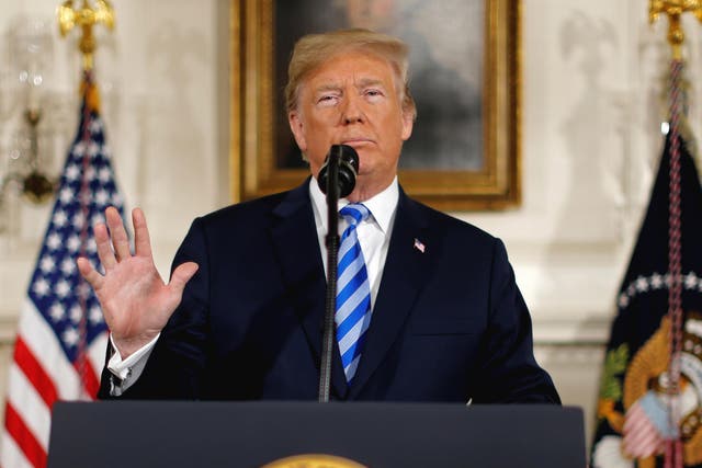 Donald Trump announces his intention to withdraw from the JCPOA Iran nuclear agreement during a statement in the Diplomatic Room at the White House