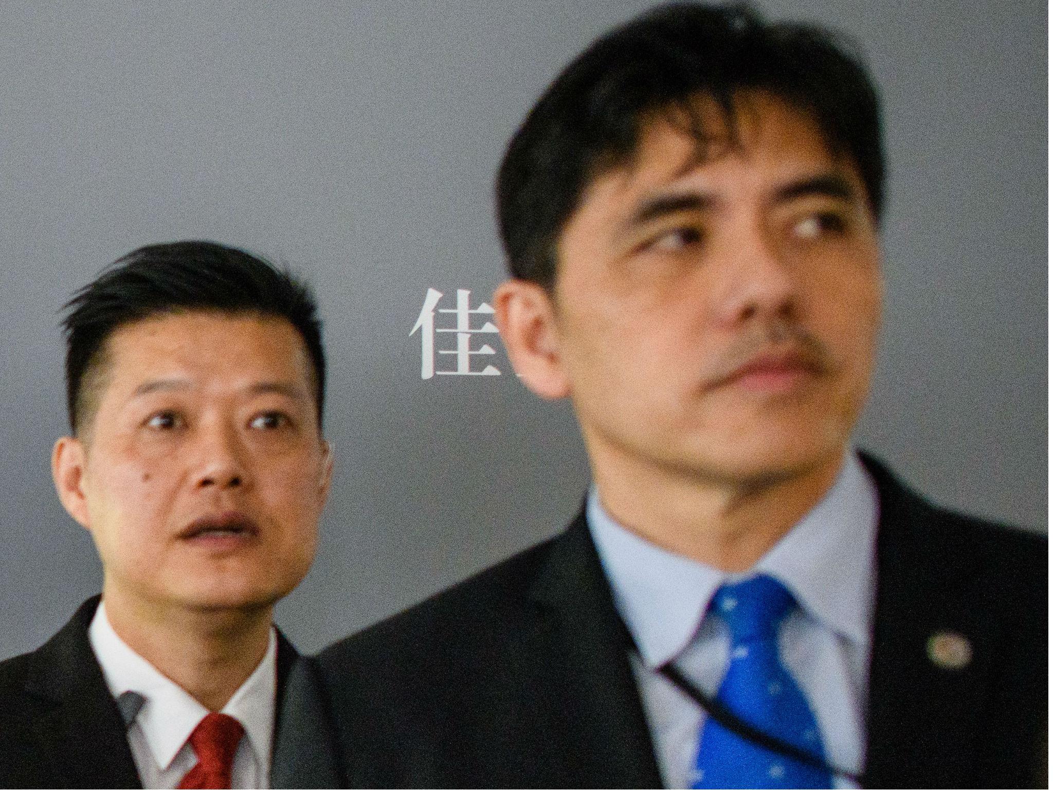 The man identified as former CIA agent Jerry Chun Shing Lee is pictured in 2017, at right