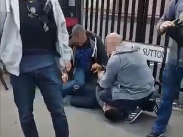 Bystanders filmed the man being detained in Aston, Birmingham, on 30 July 2017