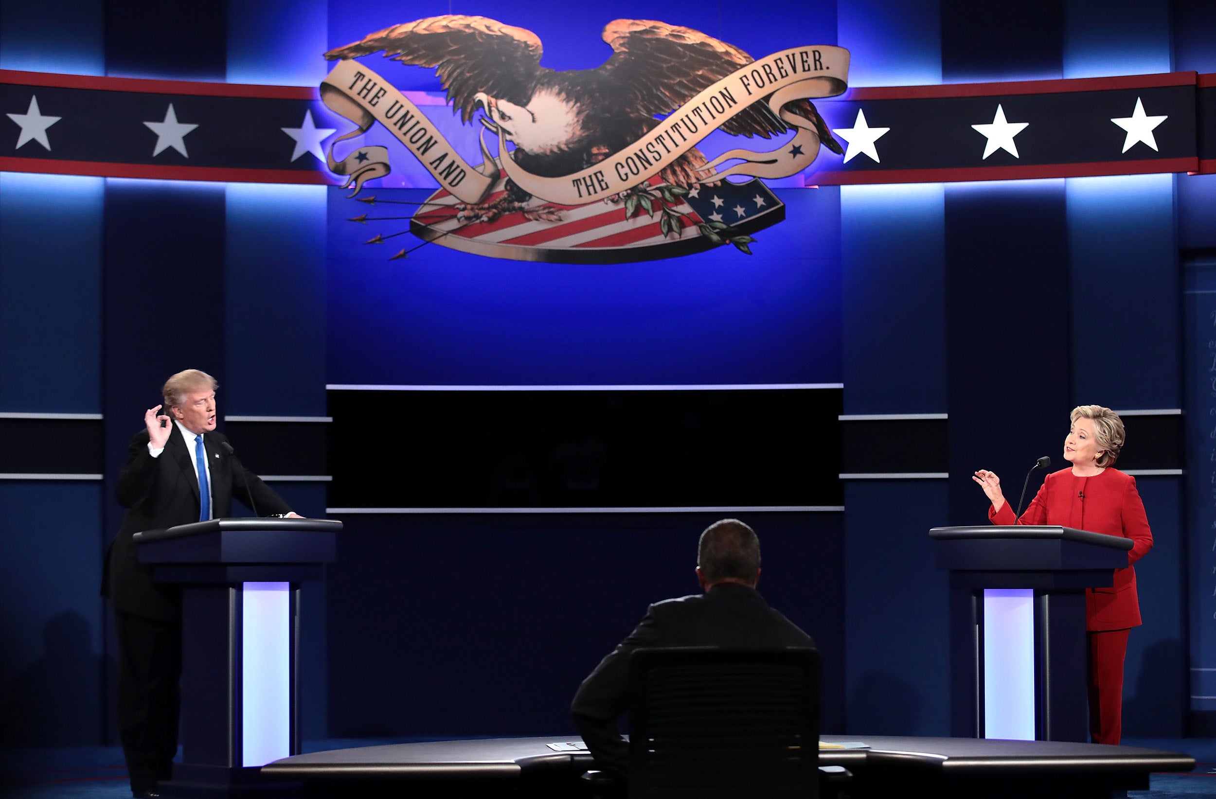Donald Trump and Hillary Clinton face-off during a televised debate during the 2016 US presidential campaign