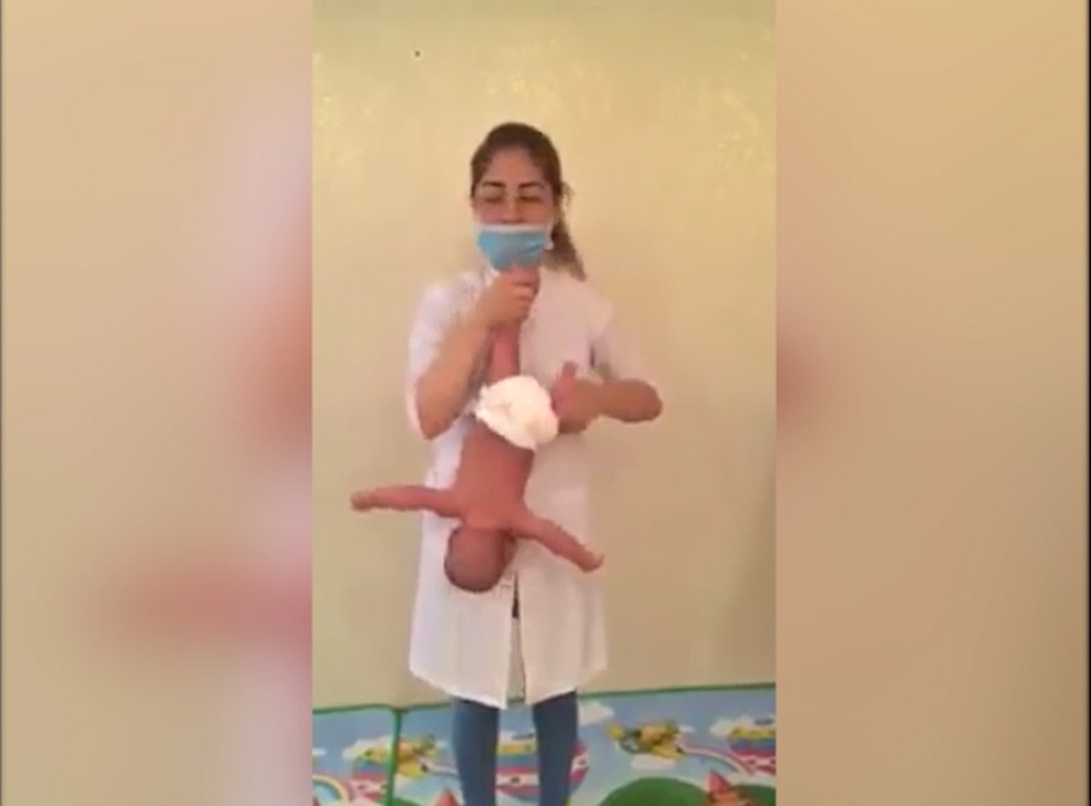Woman Swings Baby From Neck As Part Of Shocking Baby Massage The Independent The Independent Woman Swings Baby From Neck As Part Of Shocking Baby Massage The Independent The Independent