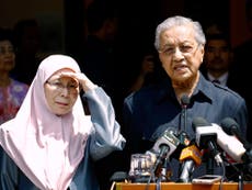 New Malaysia PM secures royal pardon for opposition icon