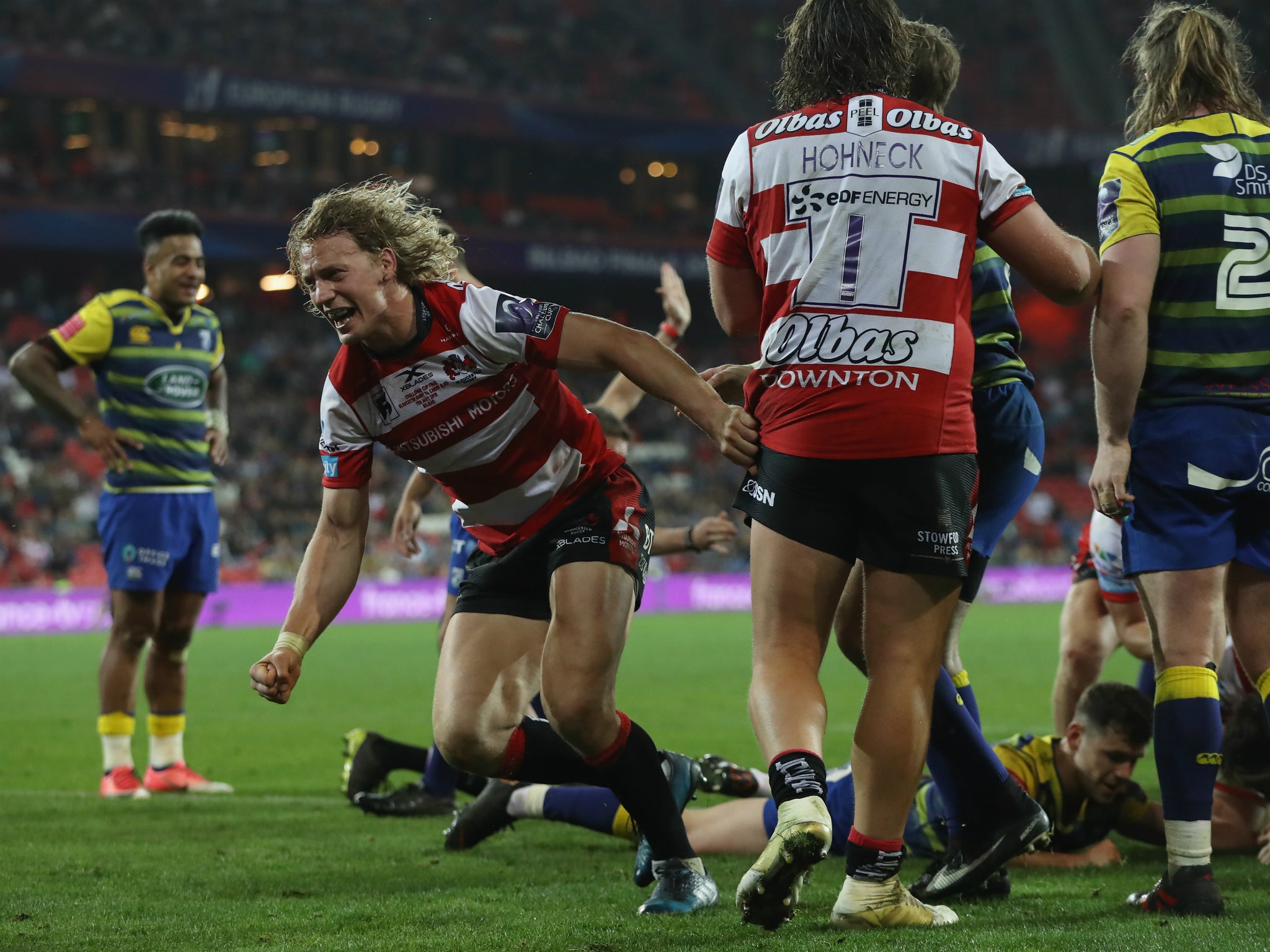 Billy Twelvetrees celebrates after James Hanson scores Gloucester's third try