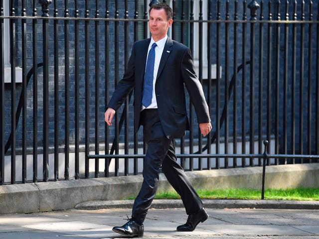 Britain's Health and Social Care Secretary Jeremy Hunt arrives at 10 Downing Street