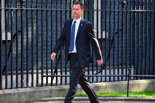 Britain's Health and Social Care Secretary Jeremy Hunt arrives at 10 Downing Street