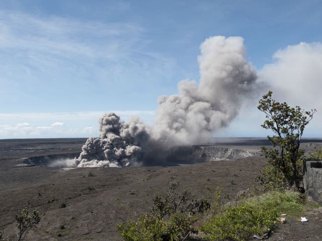 An ash plume rises from the Overlook Vent in Halema'uma'u crater of the Kilauea volcano on the Big Island of Hawaii