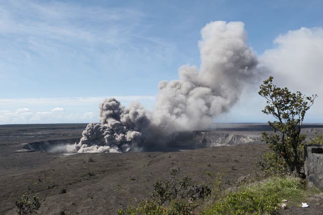 An ash plume rises from the Overlook Vent in Halema'uma'u crater of the Kilauea volcano on the Big Island of Hawaii