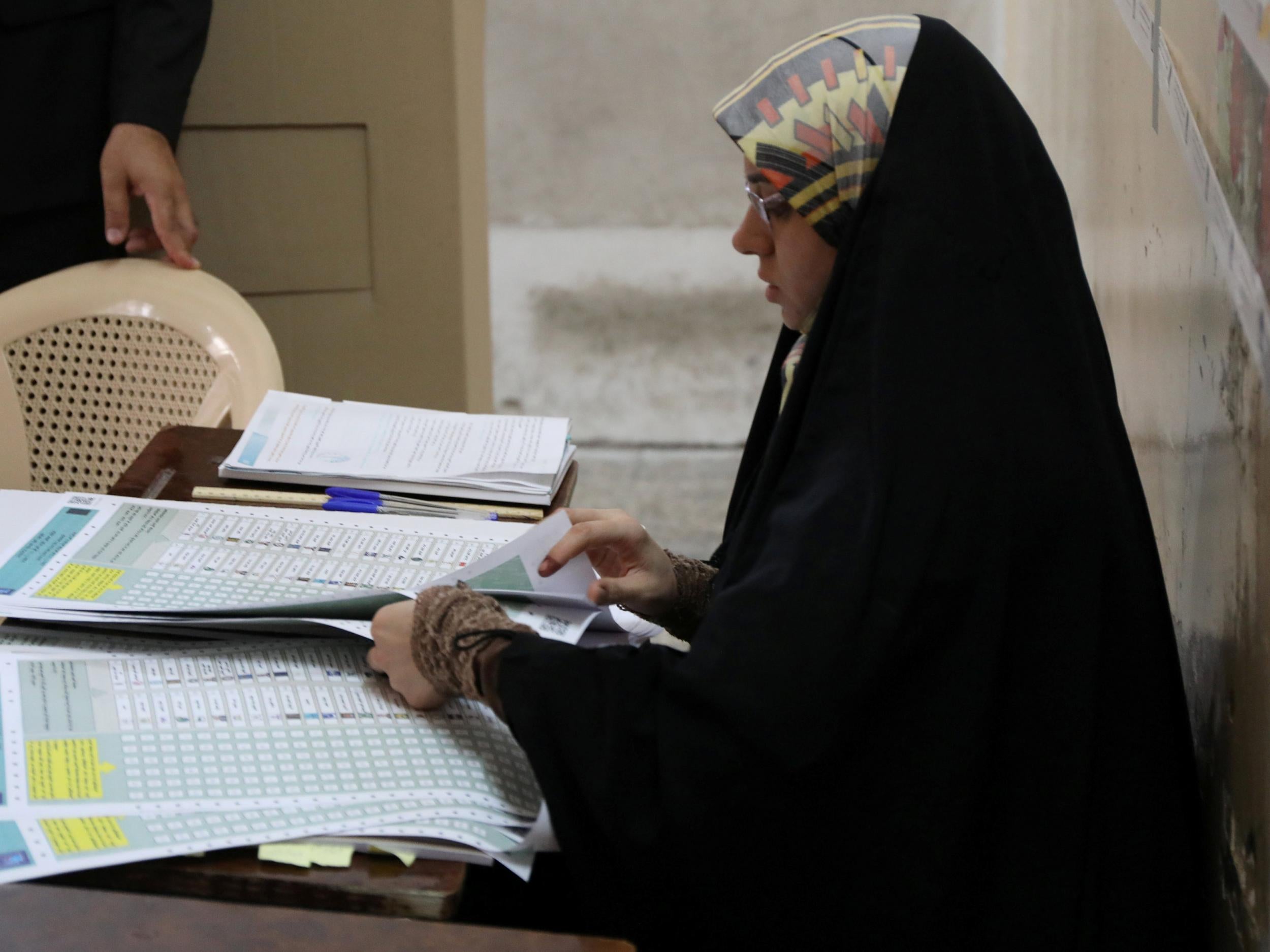 Iraq's Independent High Electoral Commission employee counts unused ballot papers