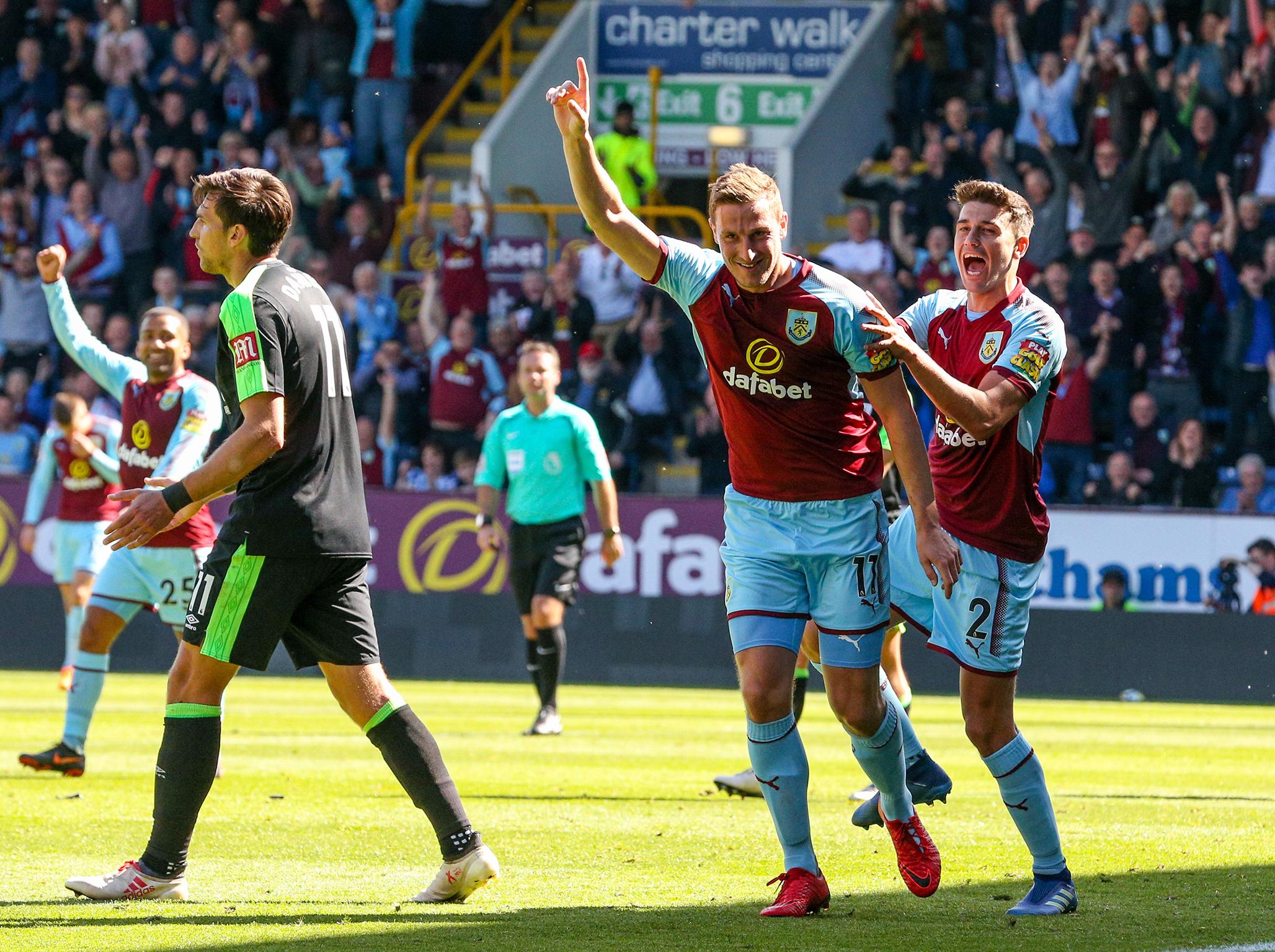 Chris Wood celebrates the game’s opener