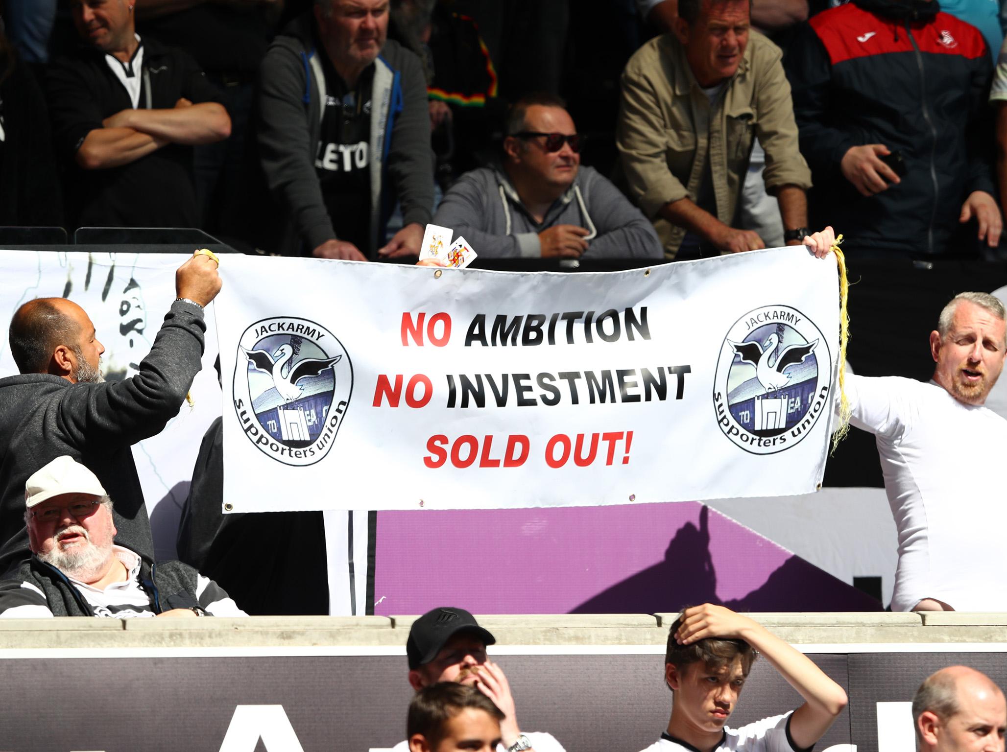 Swansea fans protest against the club’s owners