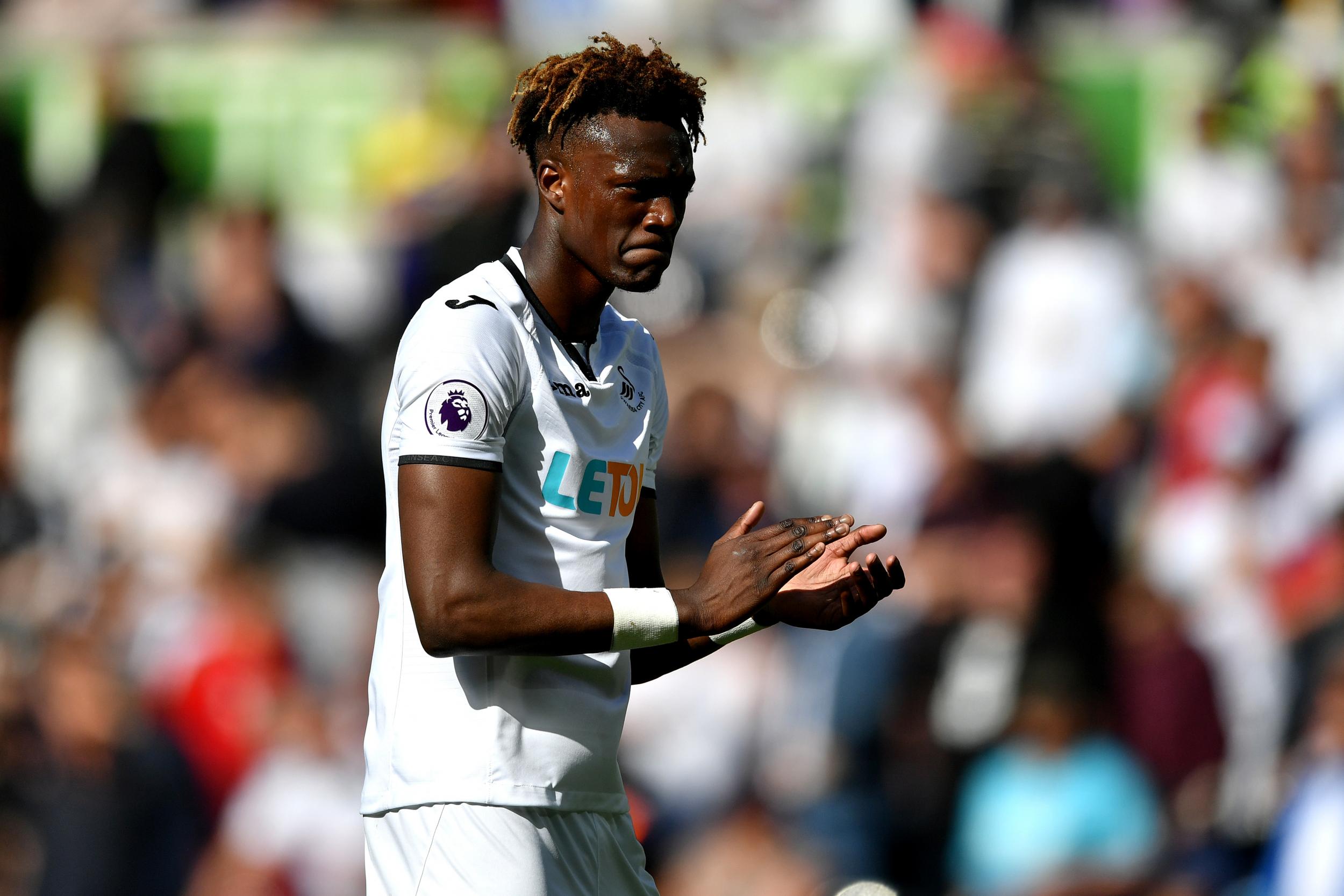 Tammy Abraham applauds the Swansea supporters