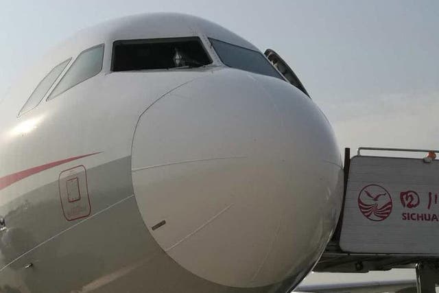 A Sichuan Airlines pilot was injured after a cockpit windscreen was ripped out at 32,000ft