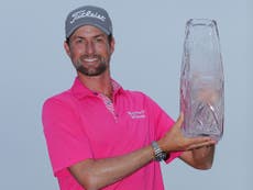 Simpson wins Players Championship after Woods charge falls short