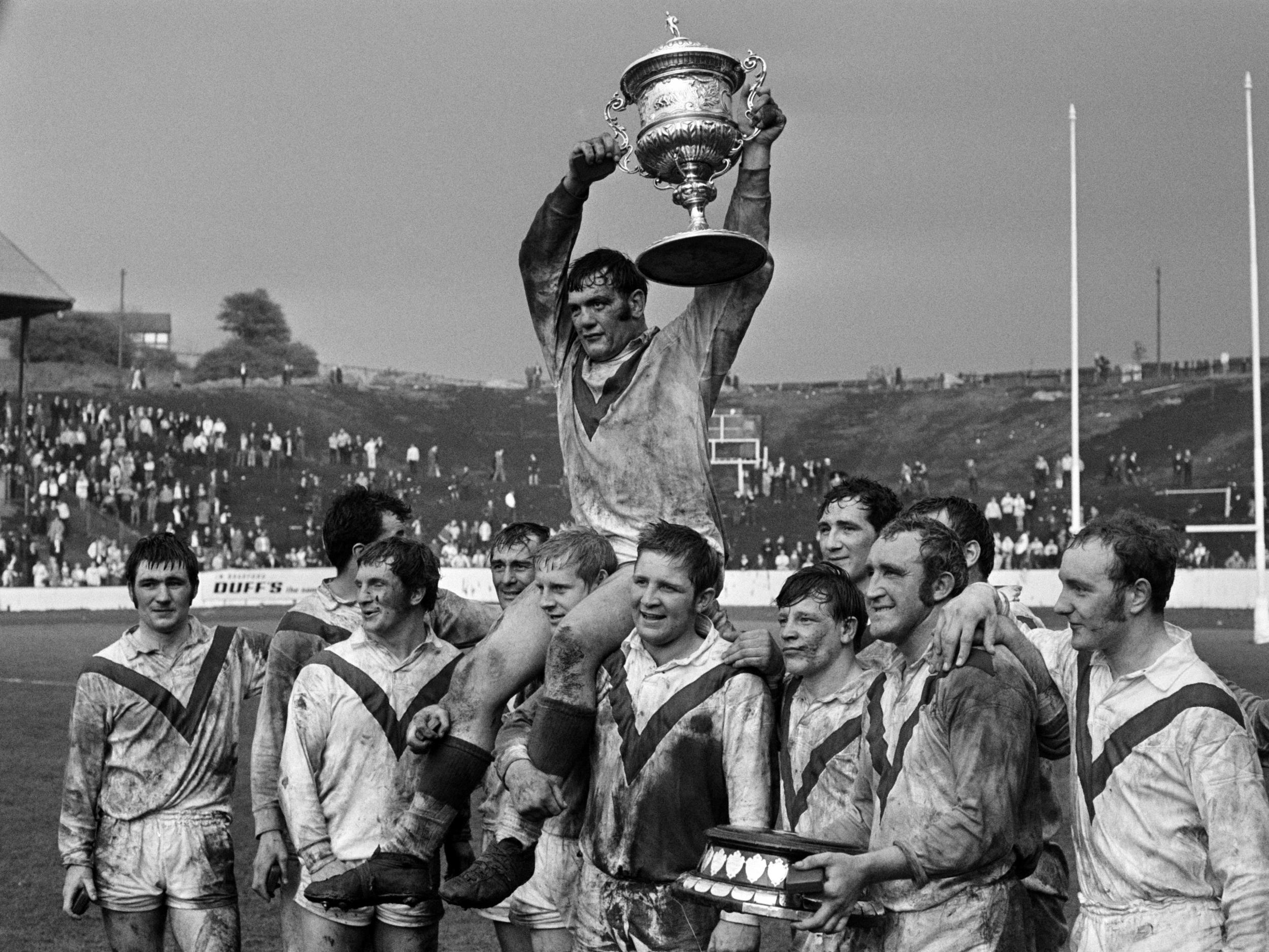 Watson is carried by his St Helens teammates after their Rugby League Championship play-off Final victory over Leeds in 1970