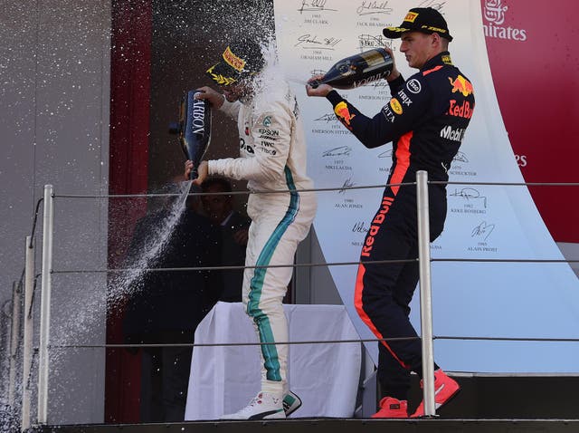 Lewis Hamilton and Max Verstappen on the podium in Barcelona
