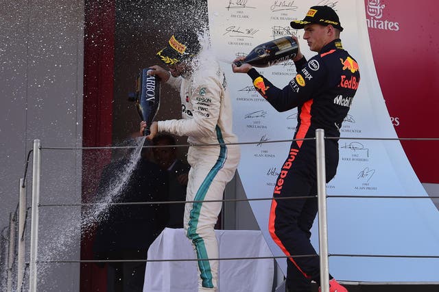 Lewis Hamilton and Max Verstappen on the podium in Barcelona