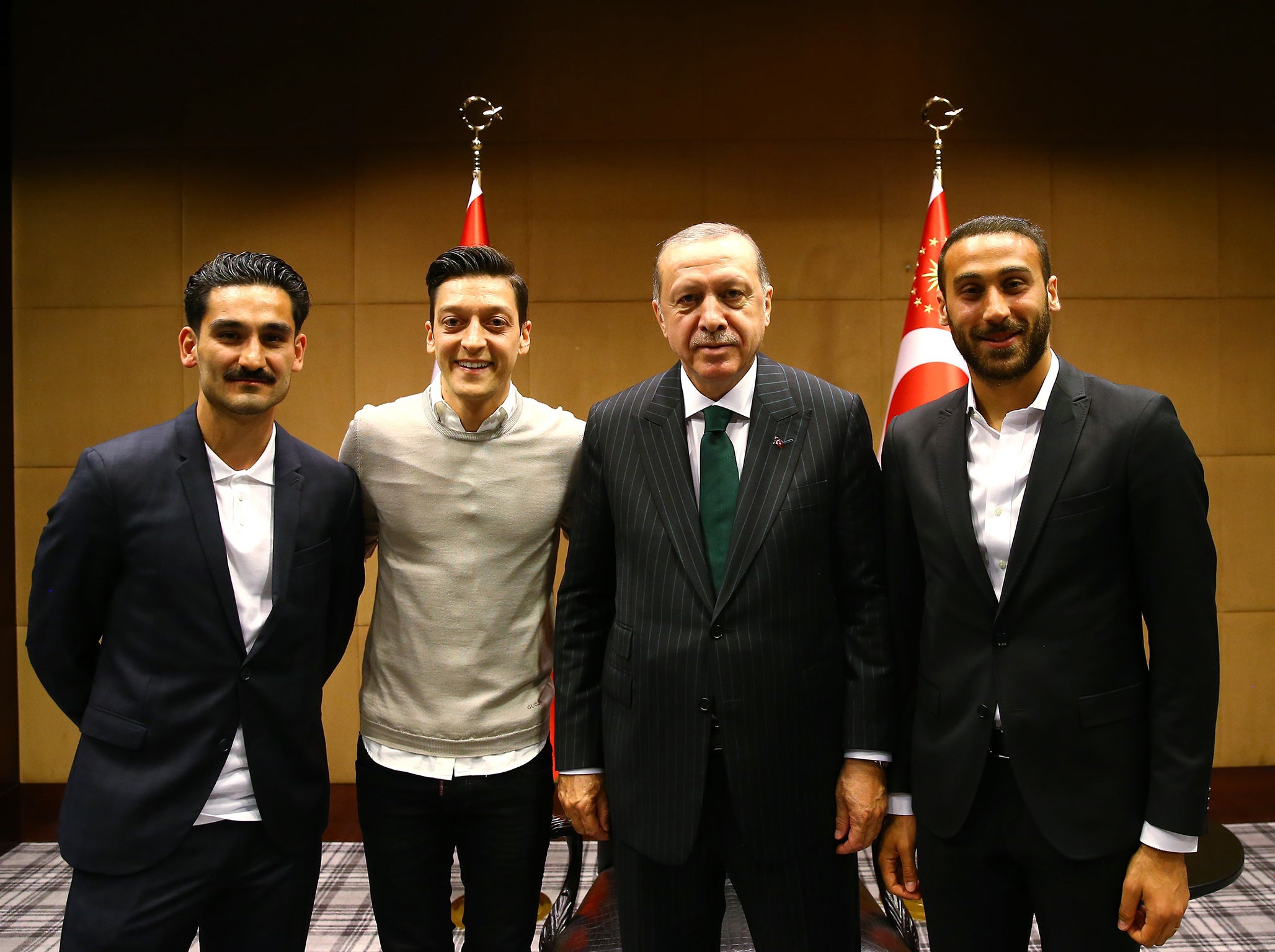 Premier League players Gündoğan (L), Özil (2L) and Tosun (R) with Erdoğan