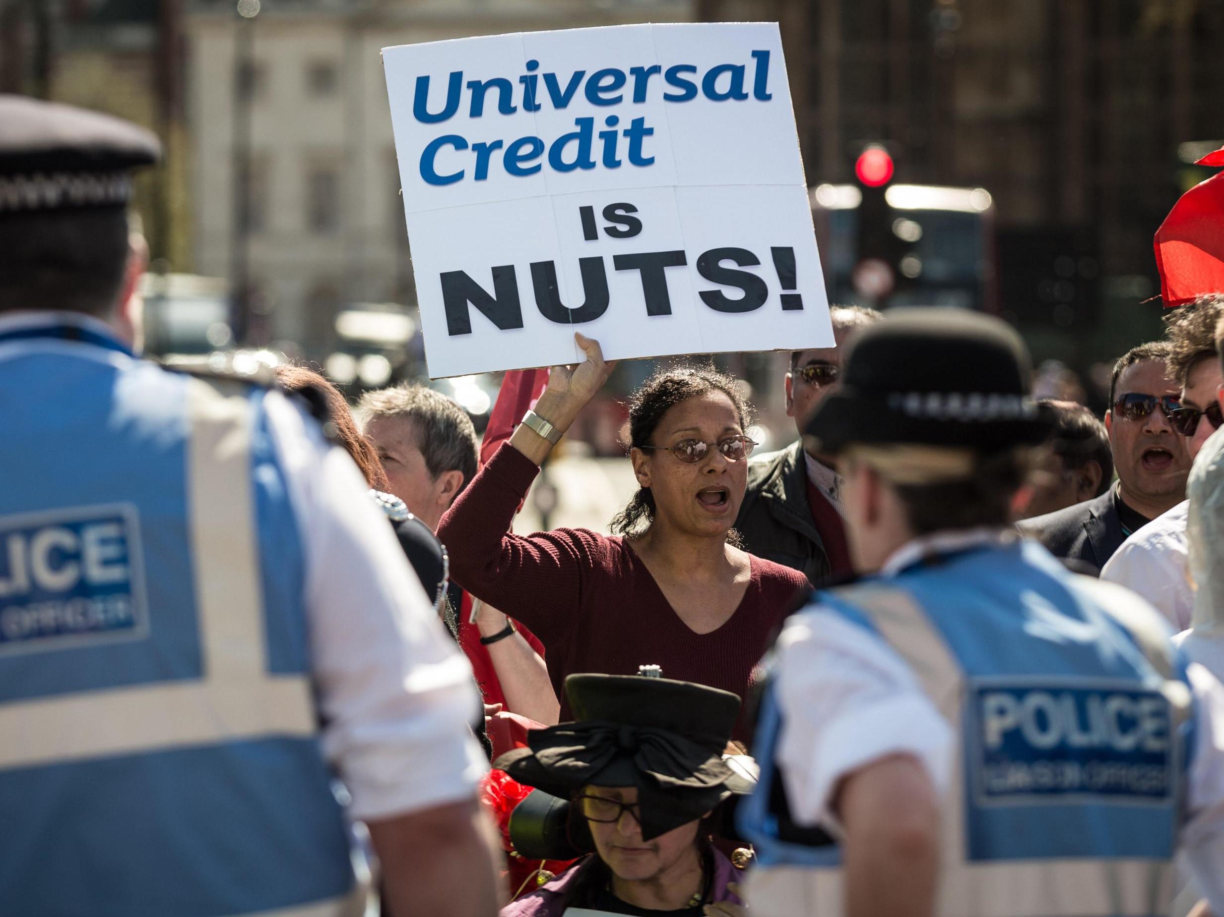 Campaigners have fought against a universal credit roll-out beset by problems