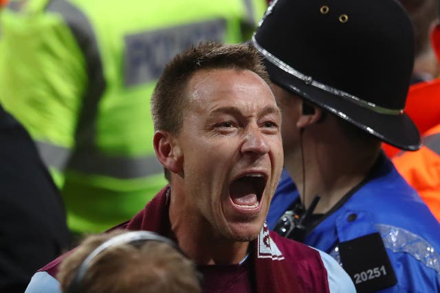 John Terry celebrates Aston Villa’s progression to the Championship play-off final