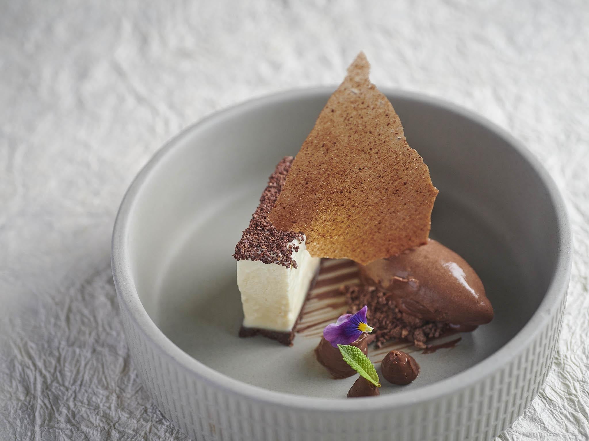 The mini parfait and dark chocolate sorbet is a nostalgic dish that shows off the high level in the kitchen