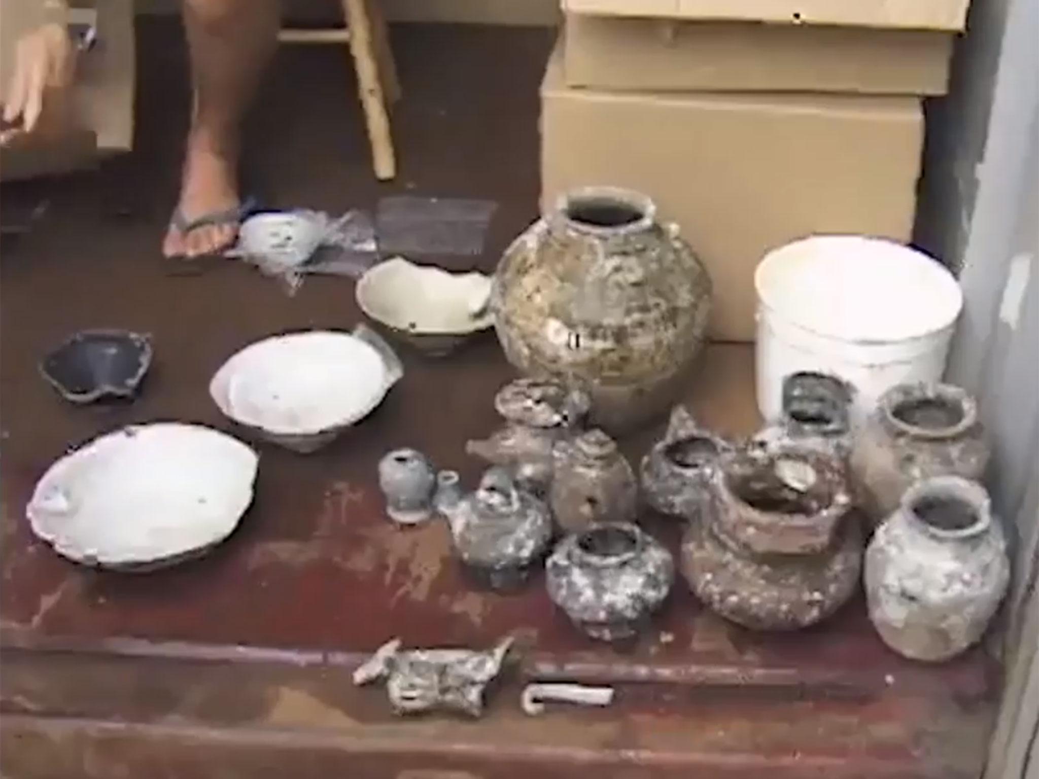 A mysterious shipwreck discovered in the 1980s off the coast of Indonesia has been traced back to a specific time and place in China owing to a stamp on a piece of pottery the archaeologists describe as being like a “made in China” label