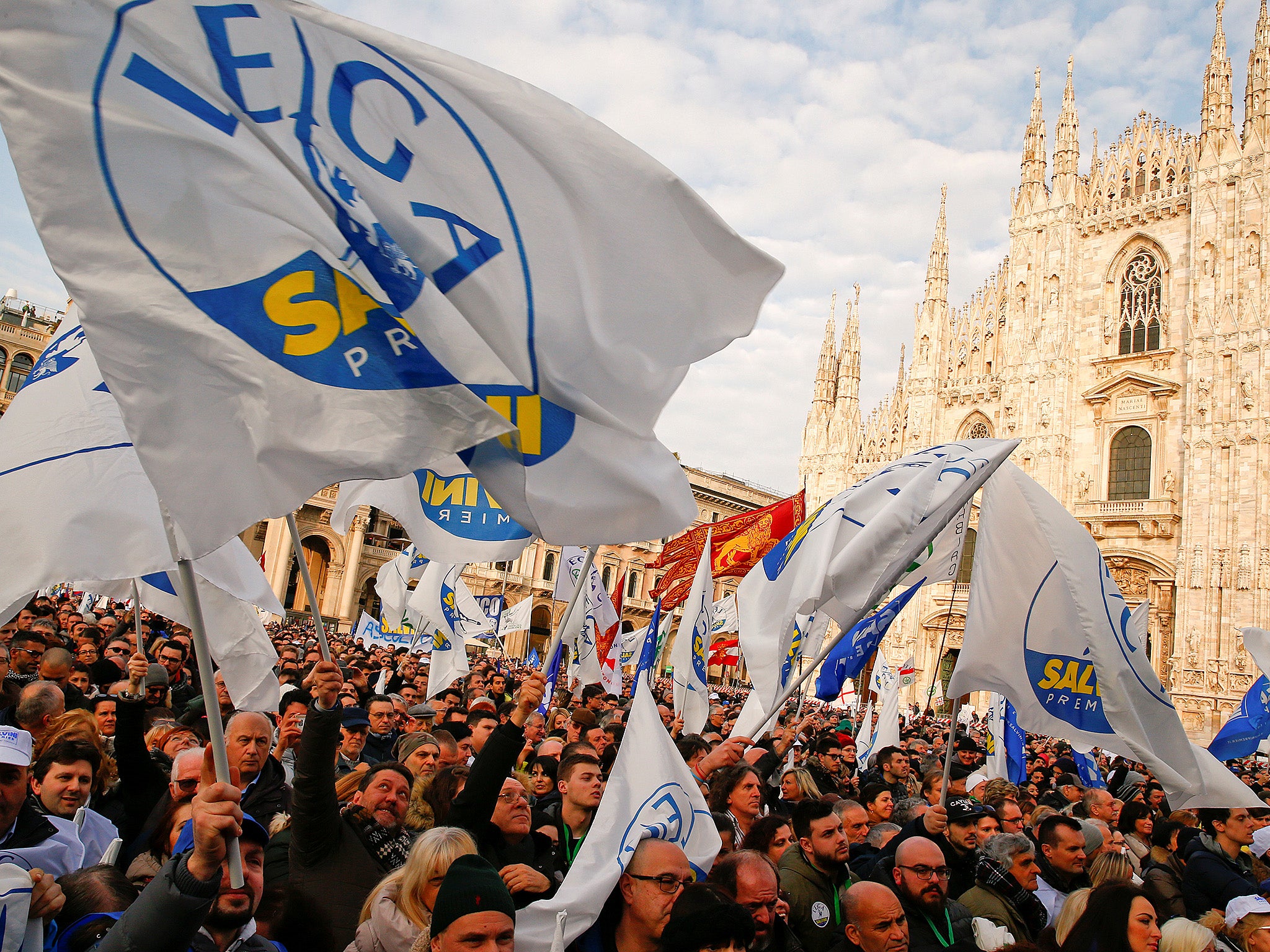 League supporters at a rally in Milan as Italy prepares for a coalition deal