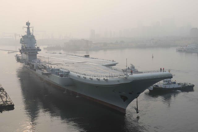 China's first domestically manufactured aircraft carrier, known only as 'Type 001A', leaves port in Dalian to begin five days of sea trials