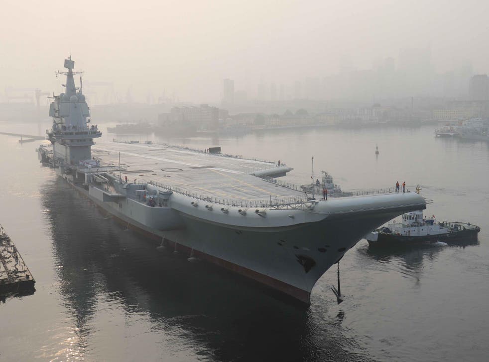 China's first domestically manufactured aircraft carrier, known only as 'Type 001A', leaves port in Dalian to begin five days of sea trials