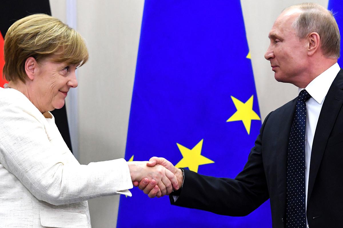 Merkel and Putin offer signs of thawing tensions at Russian talks on Syria, Iran and Ukraine