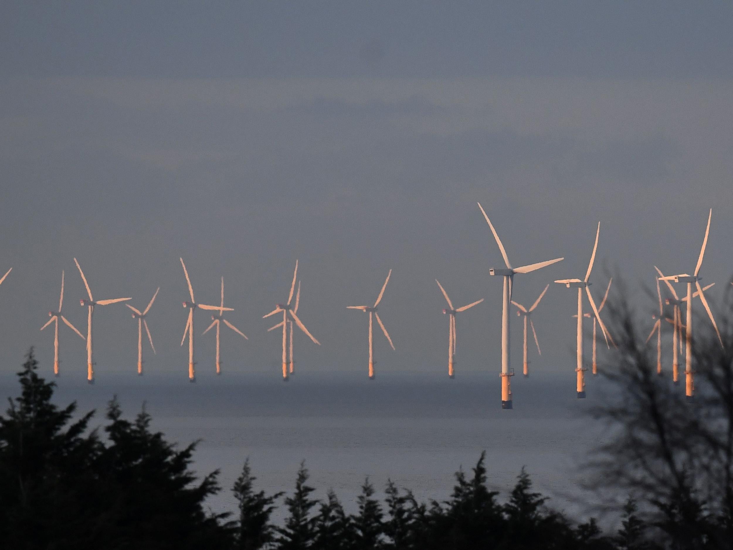 An offshore wind farm off the coast of Wales: The technology behind energy from renewable sources has developed rapidly