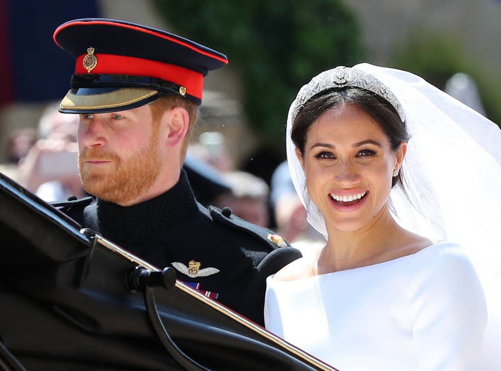 Meghan Markle and Prince Harry leave St George’s Chapel at Windsor Castle after their wedding