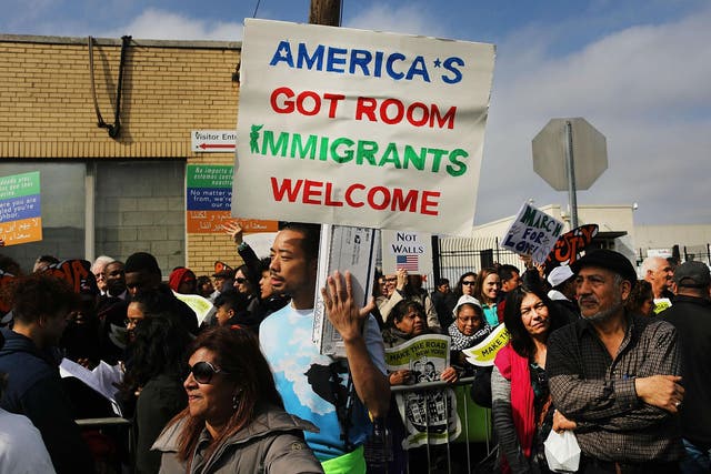 Pro-immigration protesters pictured at a rally in New Jersey