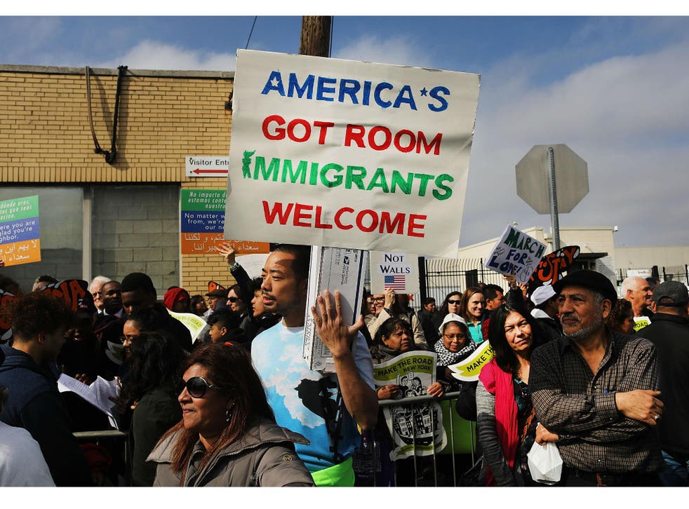 Pro-immigration protesters pictured at a rally in New Jersey