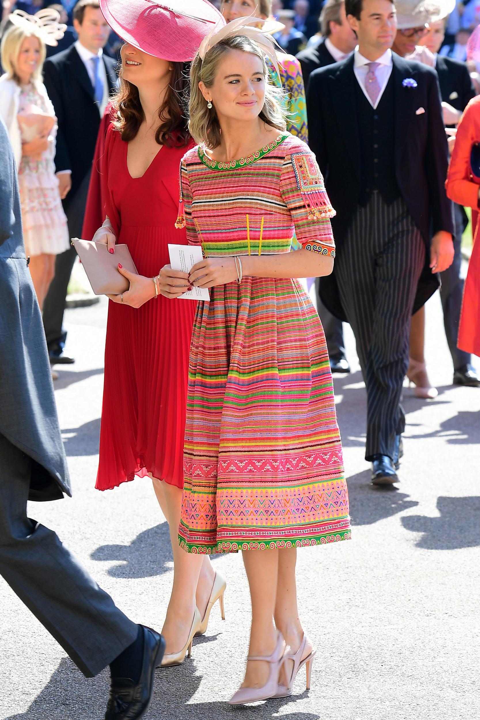 Cressida Bonas attends the royal wedding wearing a colourful ensemble by British designer Eponine.
