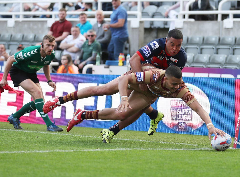 Huddersfield Giants’ Darnell McIntosh touches down