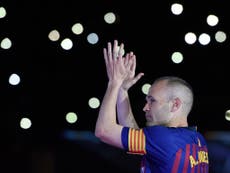 Iniesta bids tearful farewell to Barcelona after final home game