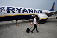 Ryanair reports record profit but warns of tough year ahead