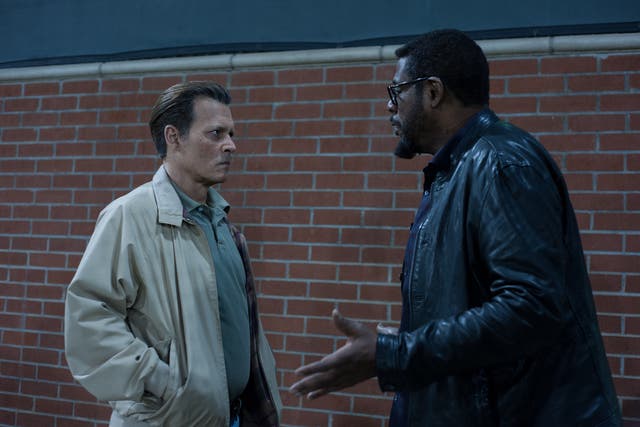 <p>Johnny Depp and Forest Whitaker in a still from 'City of Lies'</p>