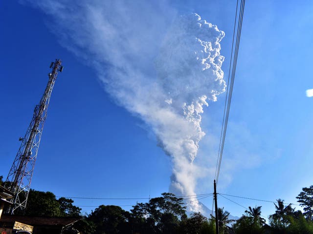 Mount Merapi spews volcanic ash during a phreatic eruption as seen from Sleman, Yogyakarta, Indonesia, 11 May, 2018