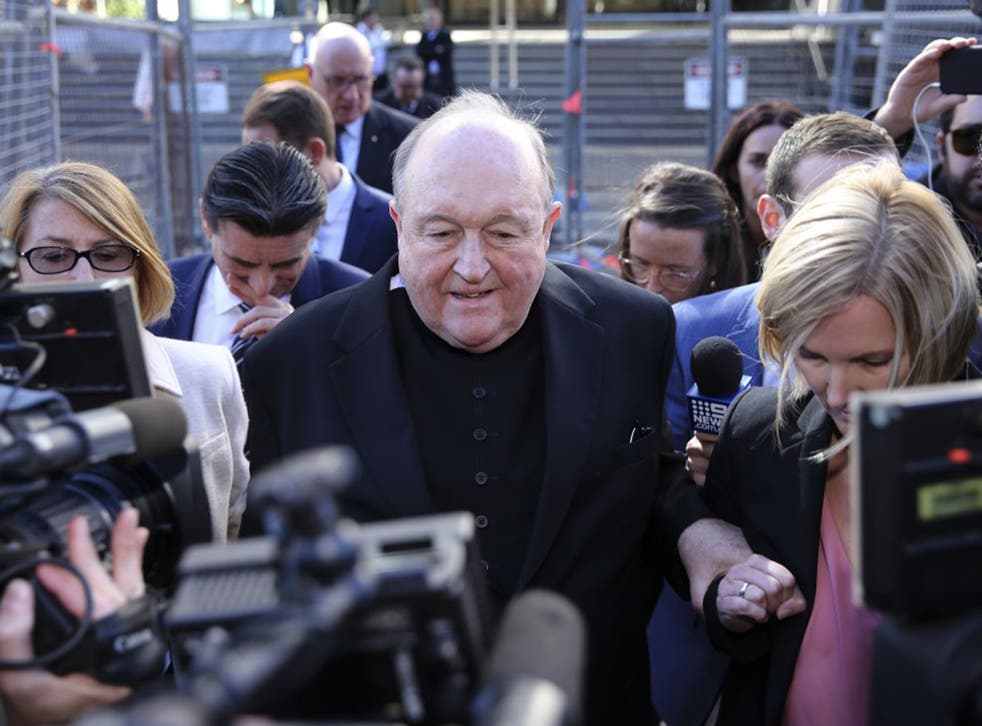 Archbishop Philip Wilson leaves the Newcastle Local Court in New South Wales