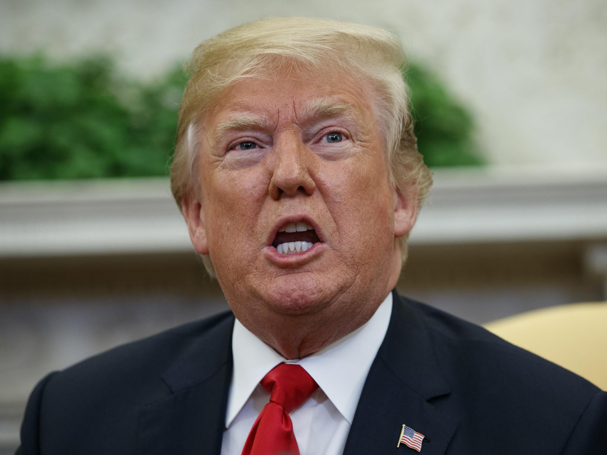 President Donald Trump speaks during a meeting with NATO Secretary General Jens Stoltenberg in the Oval Office of the White House, Thursday, May 17, 2018, in Washington