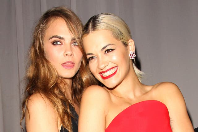 Cara Delevingne with Rita Ora at a Netflix afterparty for the 2015 Golden Globe awards.
